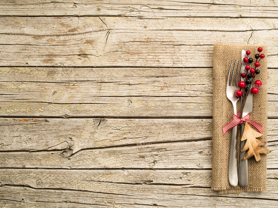High angle view of christmas ornaments on wooden table