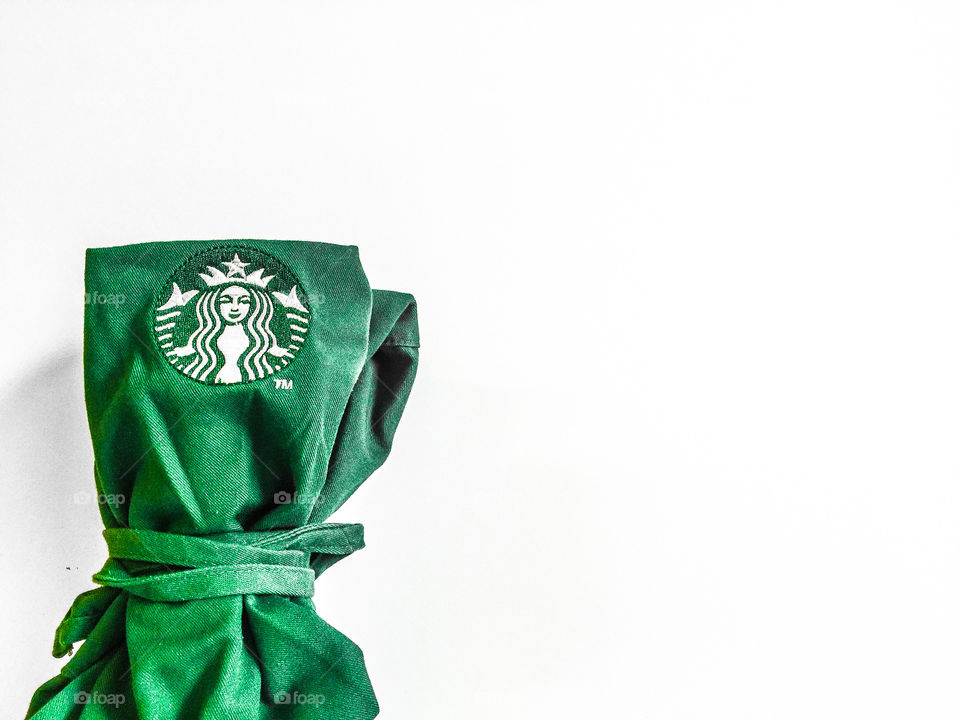 Vibrant Starbucks green apron with siren logo