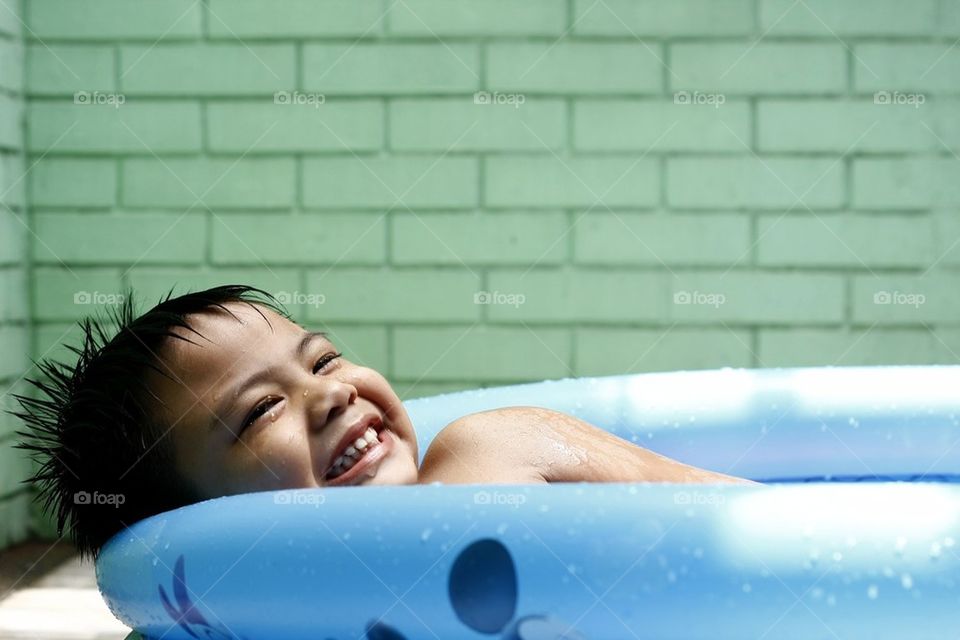 Little boy in a pool