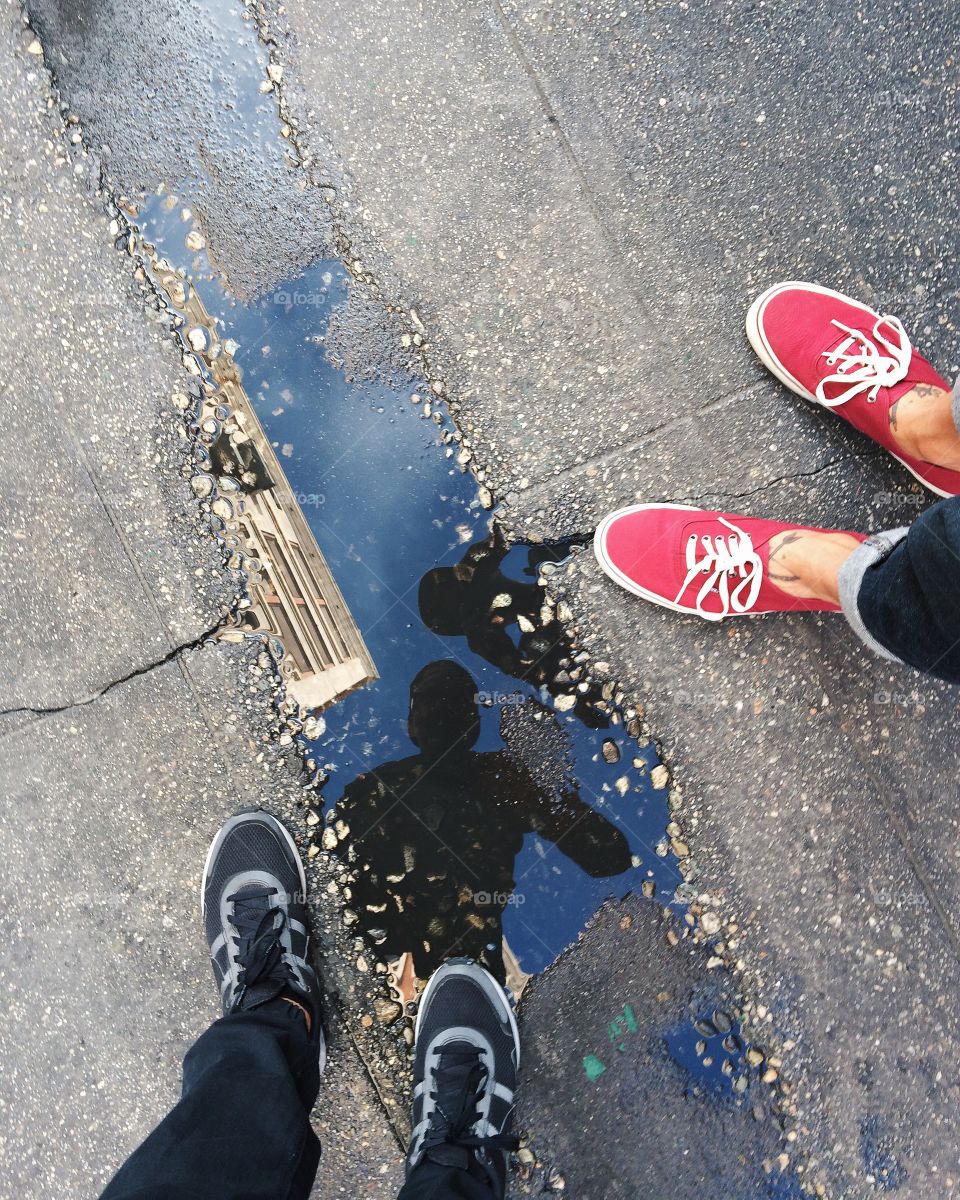 Me and a friend staring into a puddle. 