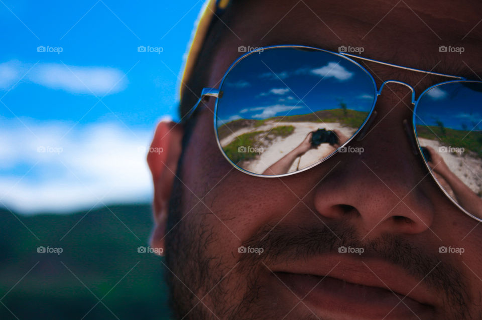 On the road to the mountains with a blue sky and good vibes
