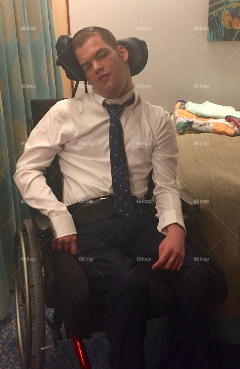 Handsome young man in wheelchair
