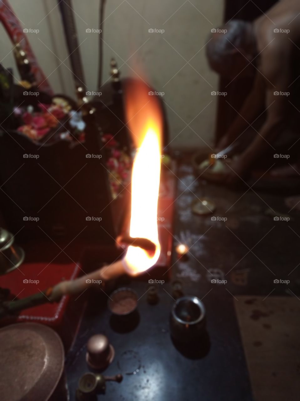 Lighting the fire stick during the last day of Diwali.