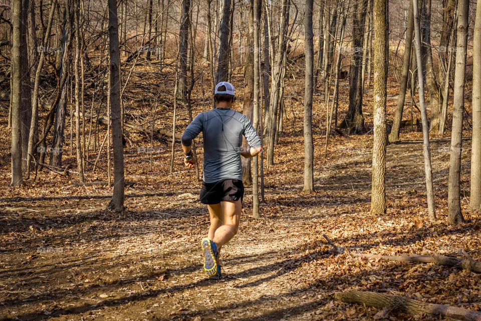 Man running on forest