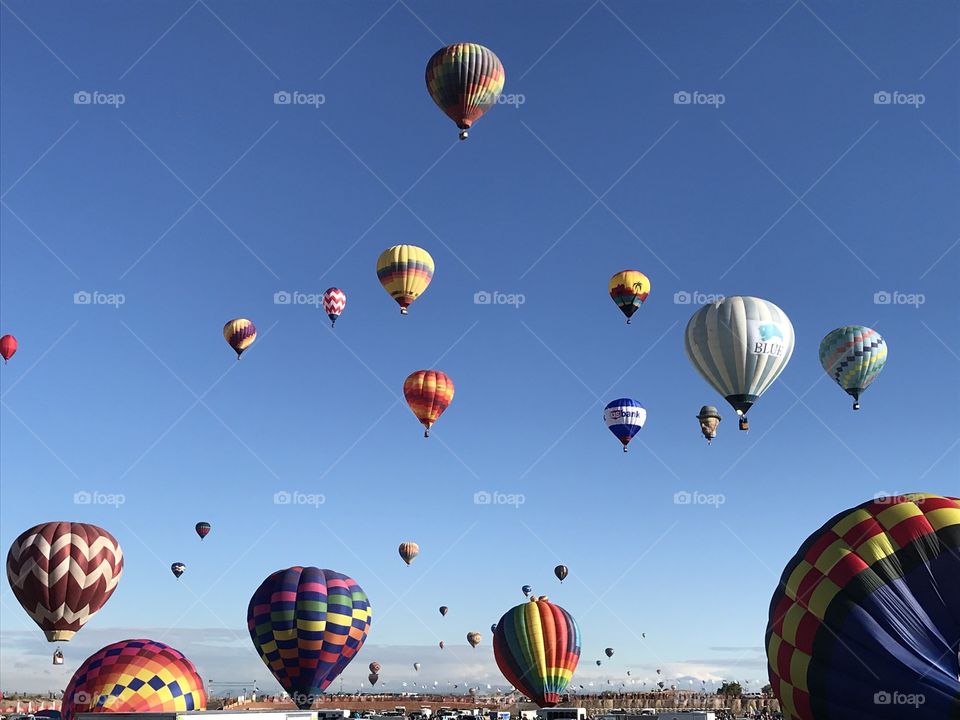 Hot-air balloons ascending in Albuquerque at the Balloon Fiesta