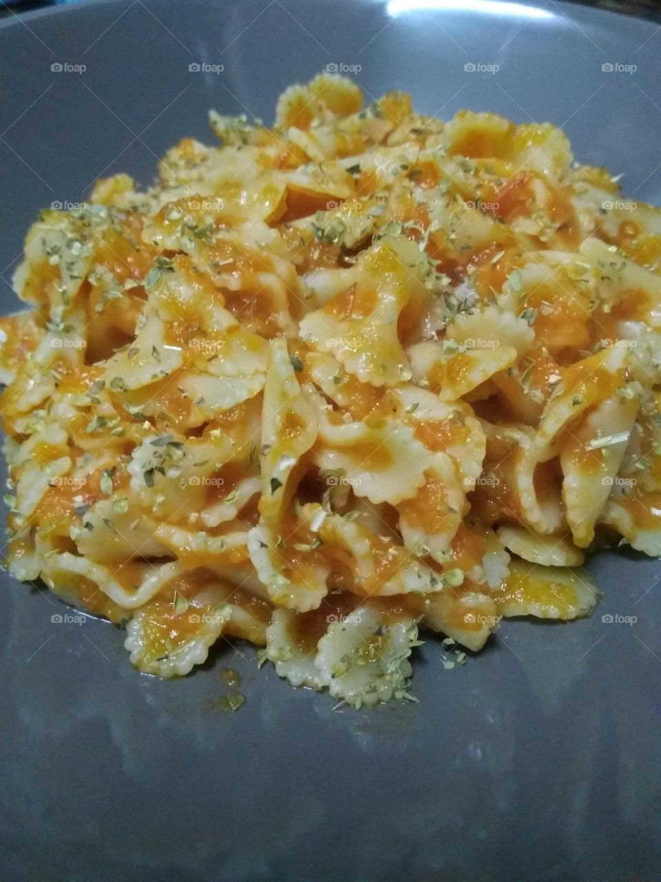 pasta with tomato sauce and basil