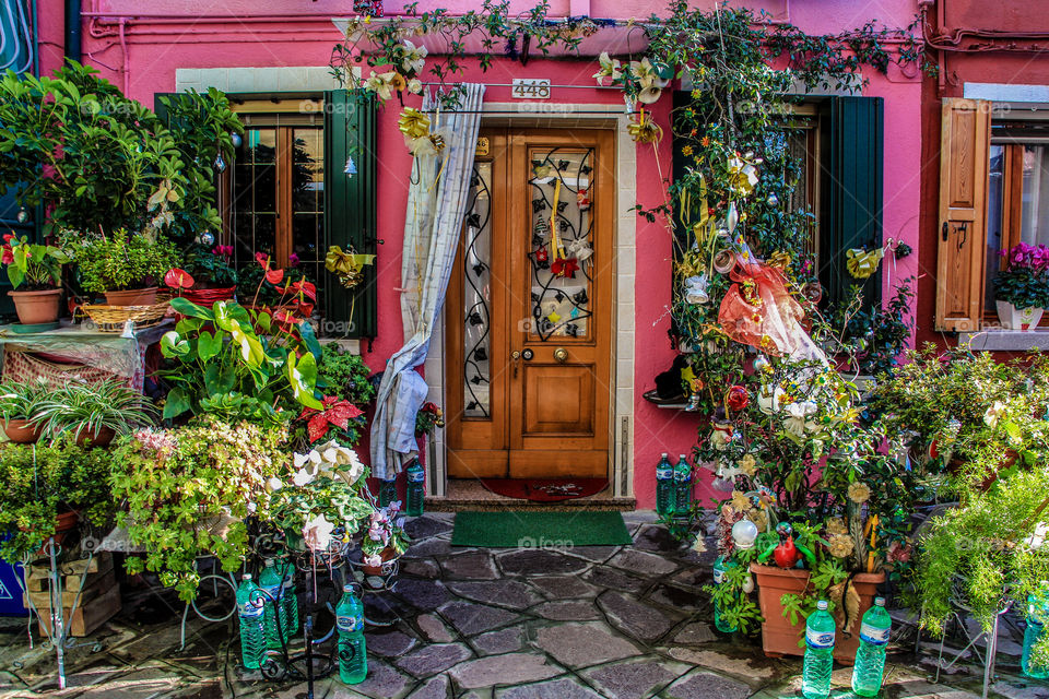 Putting plant pots in front of your door will cheer you up and people passing by you.