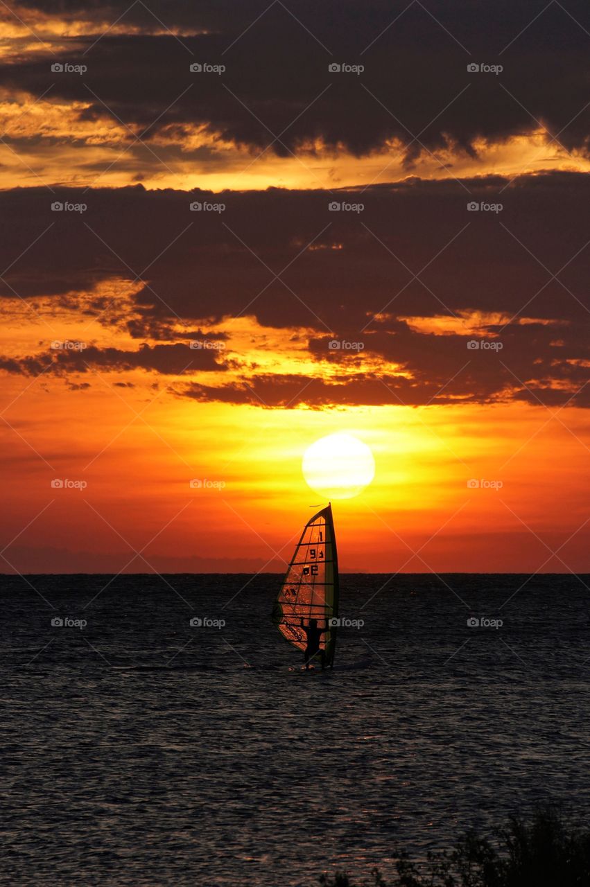 Nautical vessel in sunset