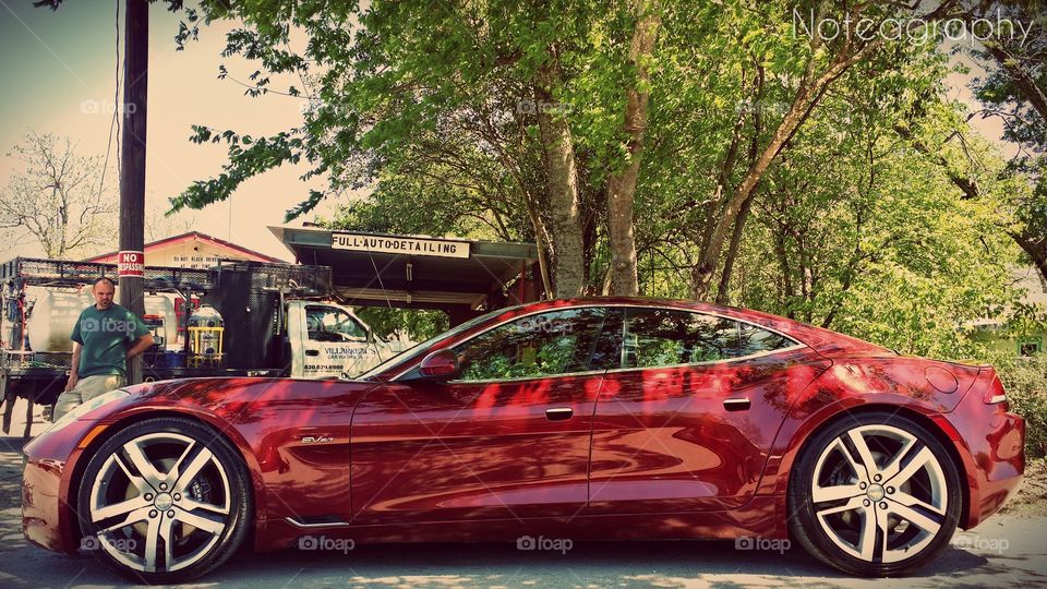 Summer Karma. This is a Fisker Karma and they are rare to see. at least they are in my city. I was lucky to get a chance to shoot this one. 