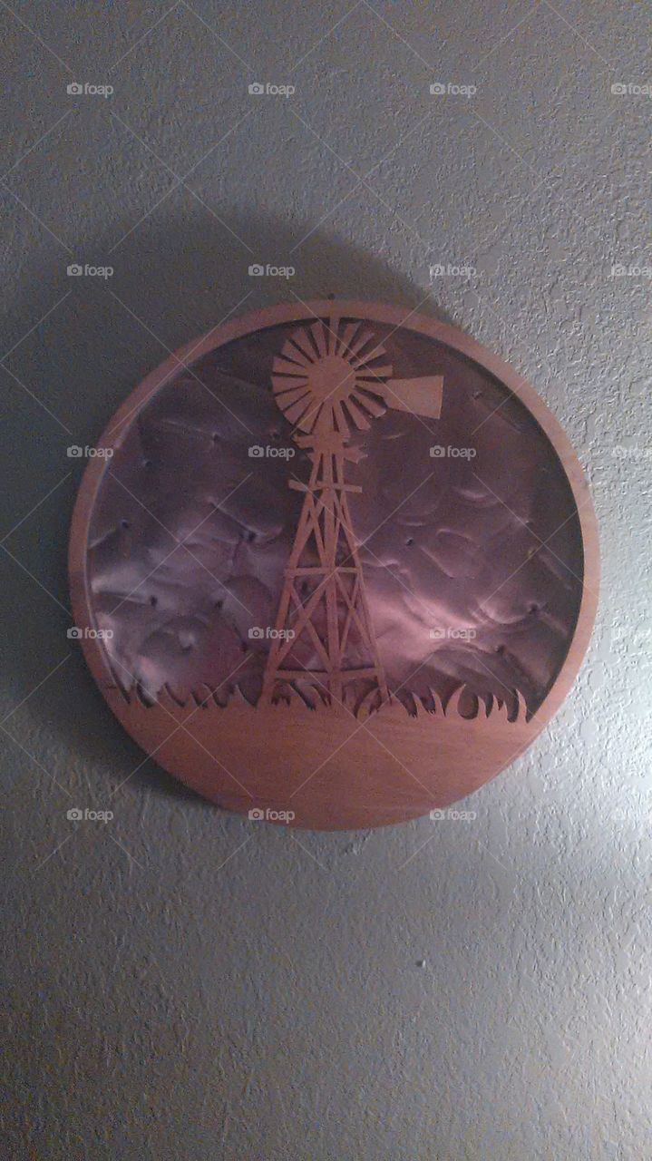 copper wind. windmill cut with a laser and hand crafted out of copper