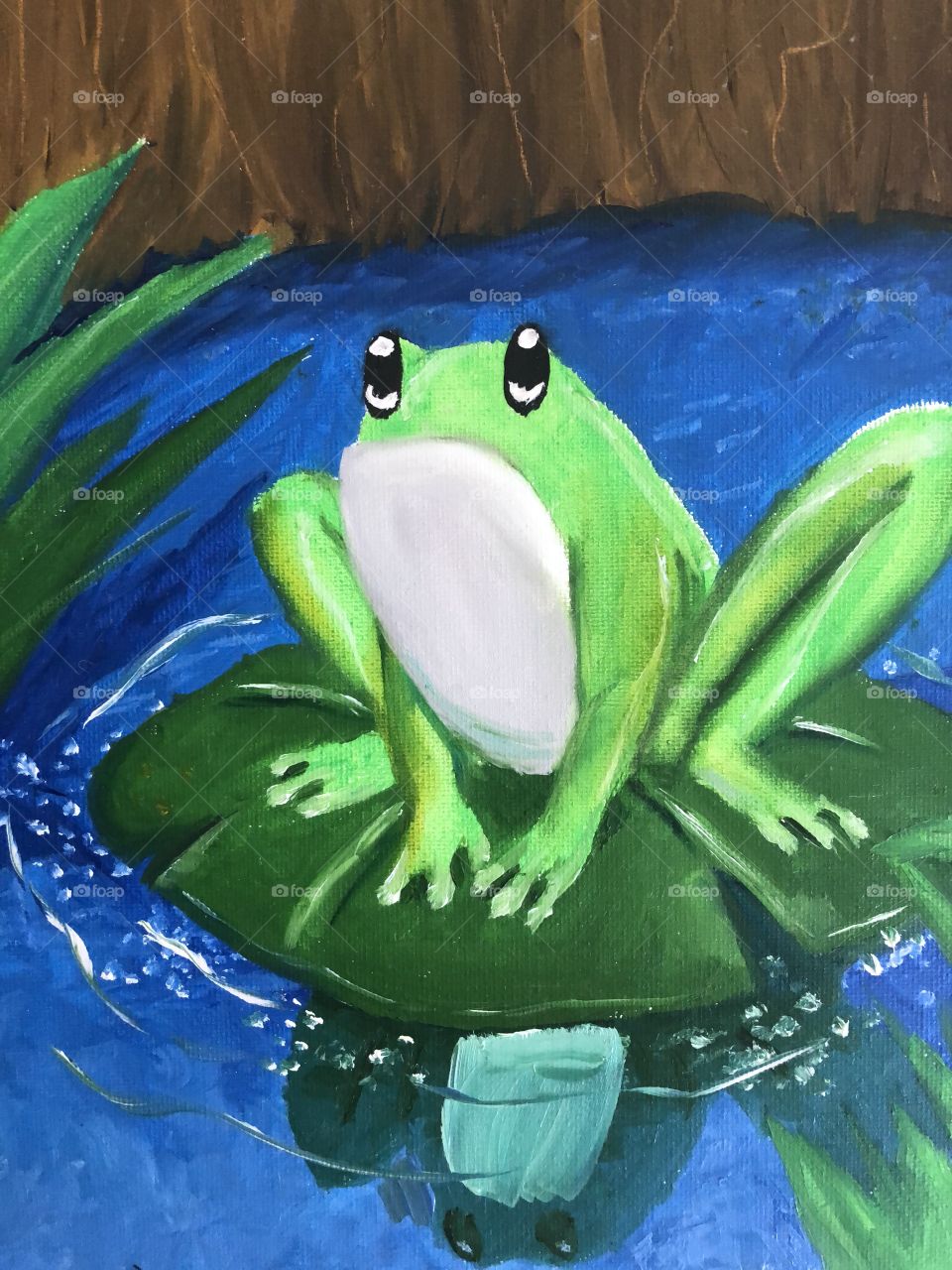 Cute painting of frog on Lilly pad in pond. 