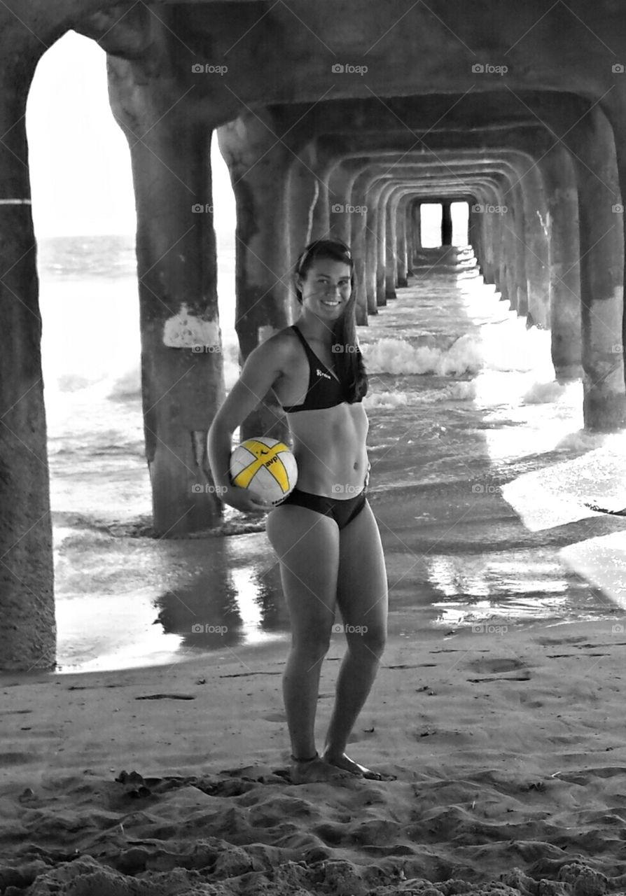 dream big. taken of my sister in her beach volleyball uniform