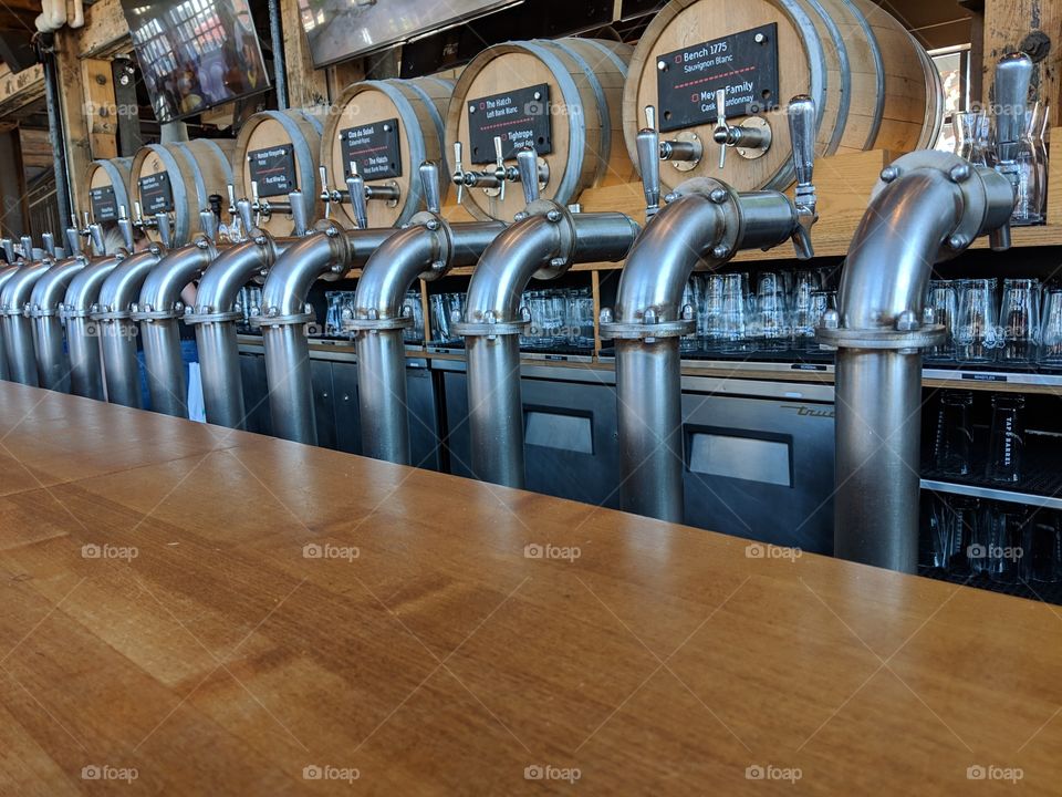 taphouse line of beer taps.