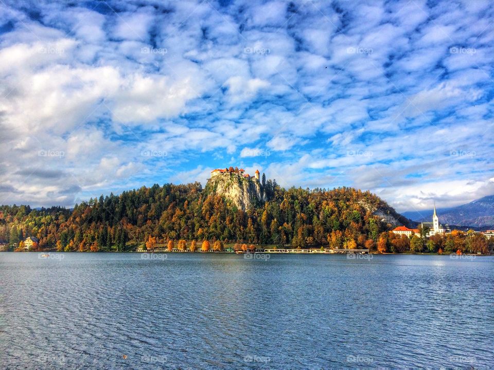 Scenic view of lake near cliff