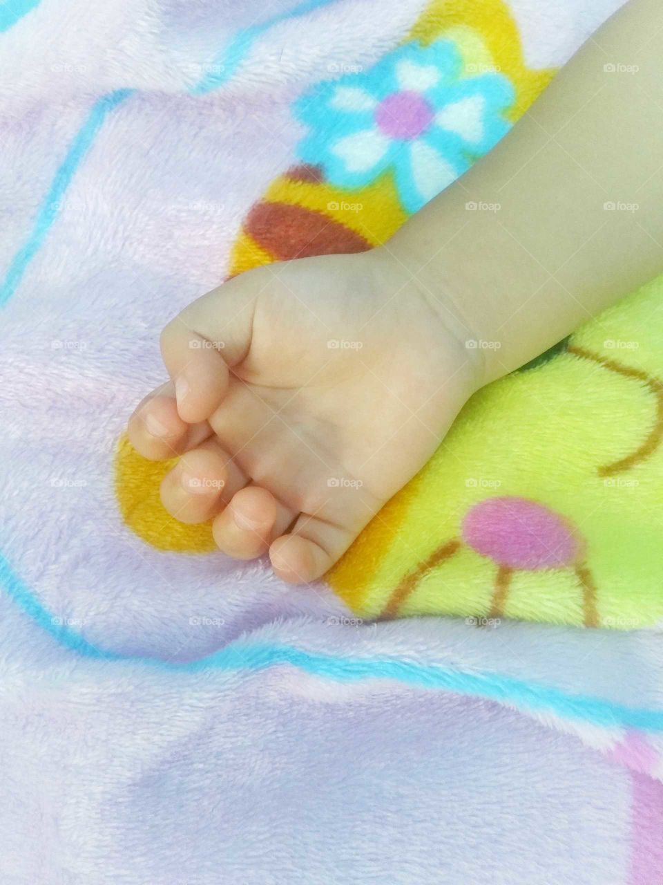 Hand of baby opened while sleeping deeply.