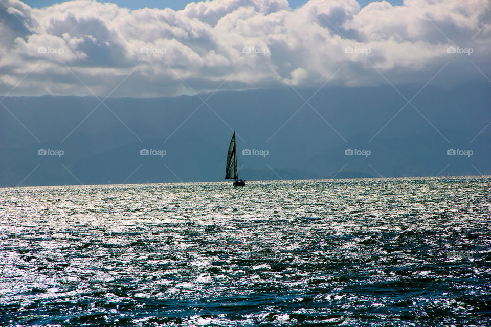 ocean boat wind island by maza