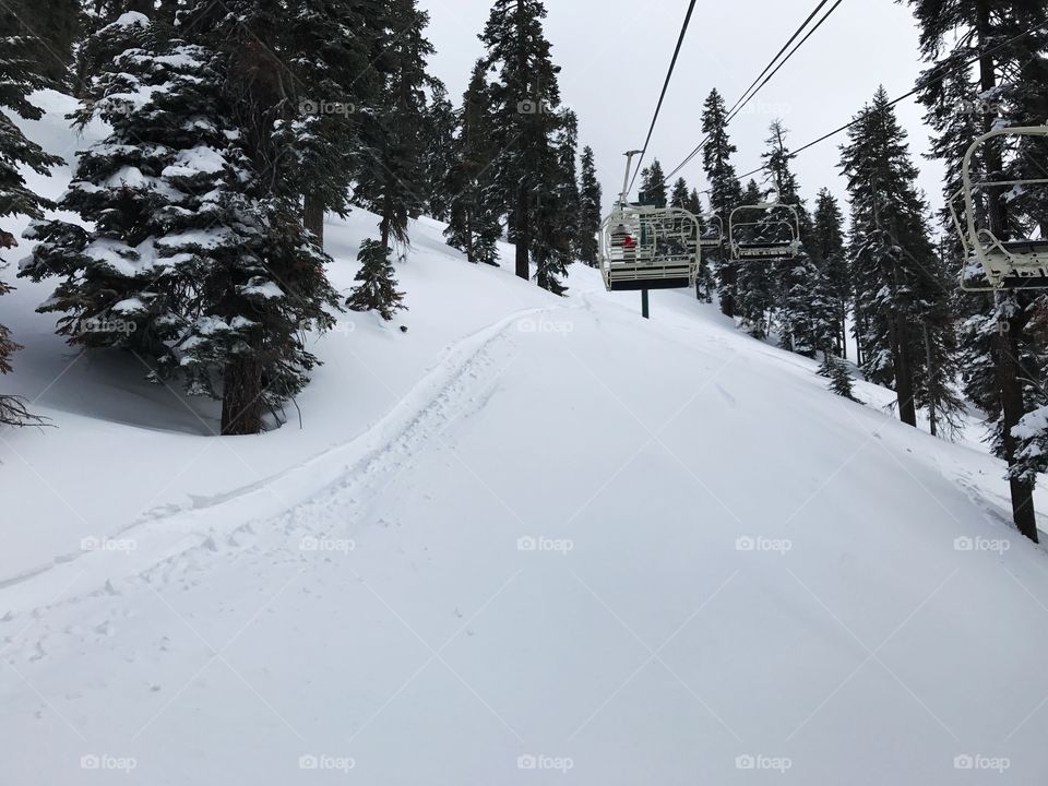 Cable car over the snowy land