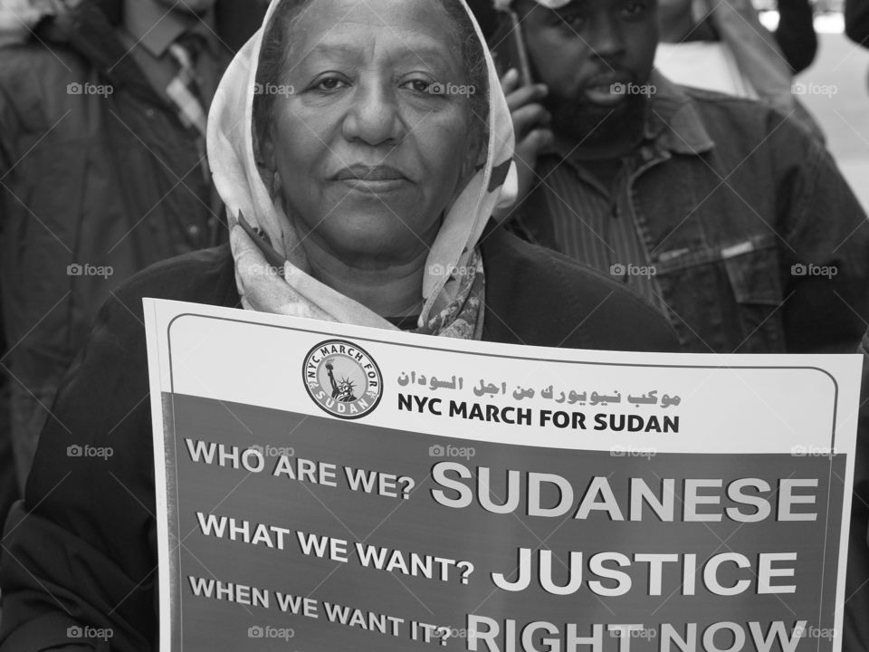 A Muslim woman marching in the 2019 NYC March For Sudan.