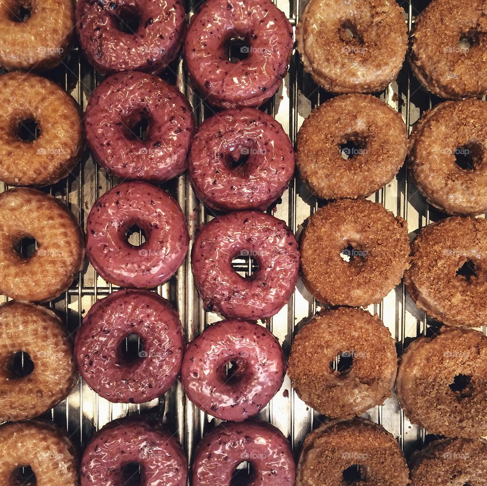 Doughnuts. . Rows of doughnuts. 