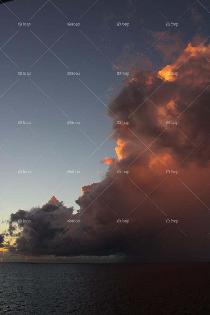 Suhnset Illuminating a Large Thunderhead