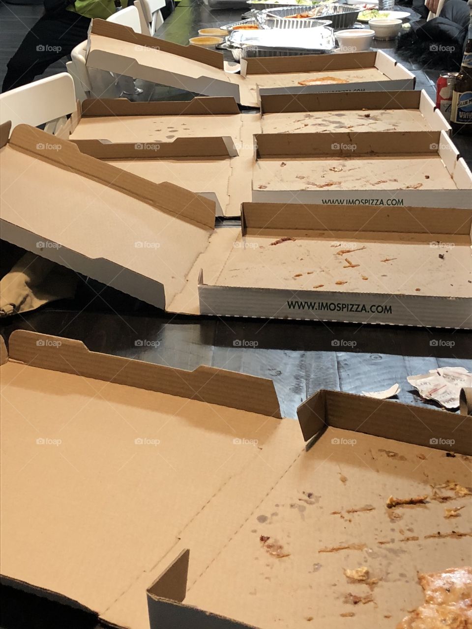Close up of empty pizza boxes.