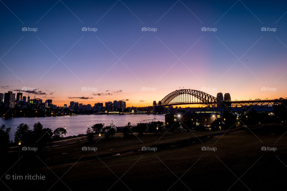 North Sydney on the left and the harbour bridge to the right with Barangaroo Reserve in the dark in the foreground. Another day when the city and I seem to be the only ones about to enjoy the sunrise