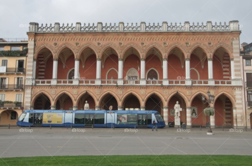 Venetian style building with modern trolley bus, Padua