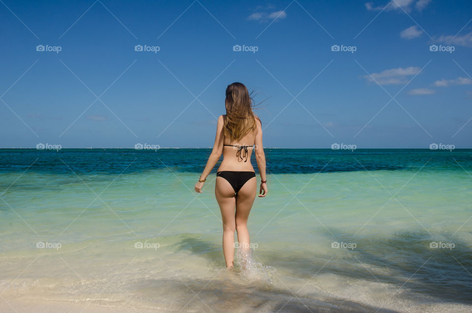 Lady at a Caribbean beach