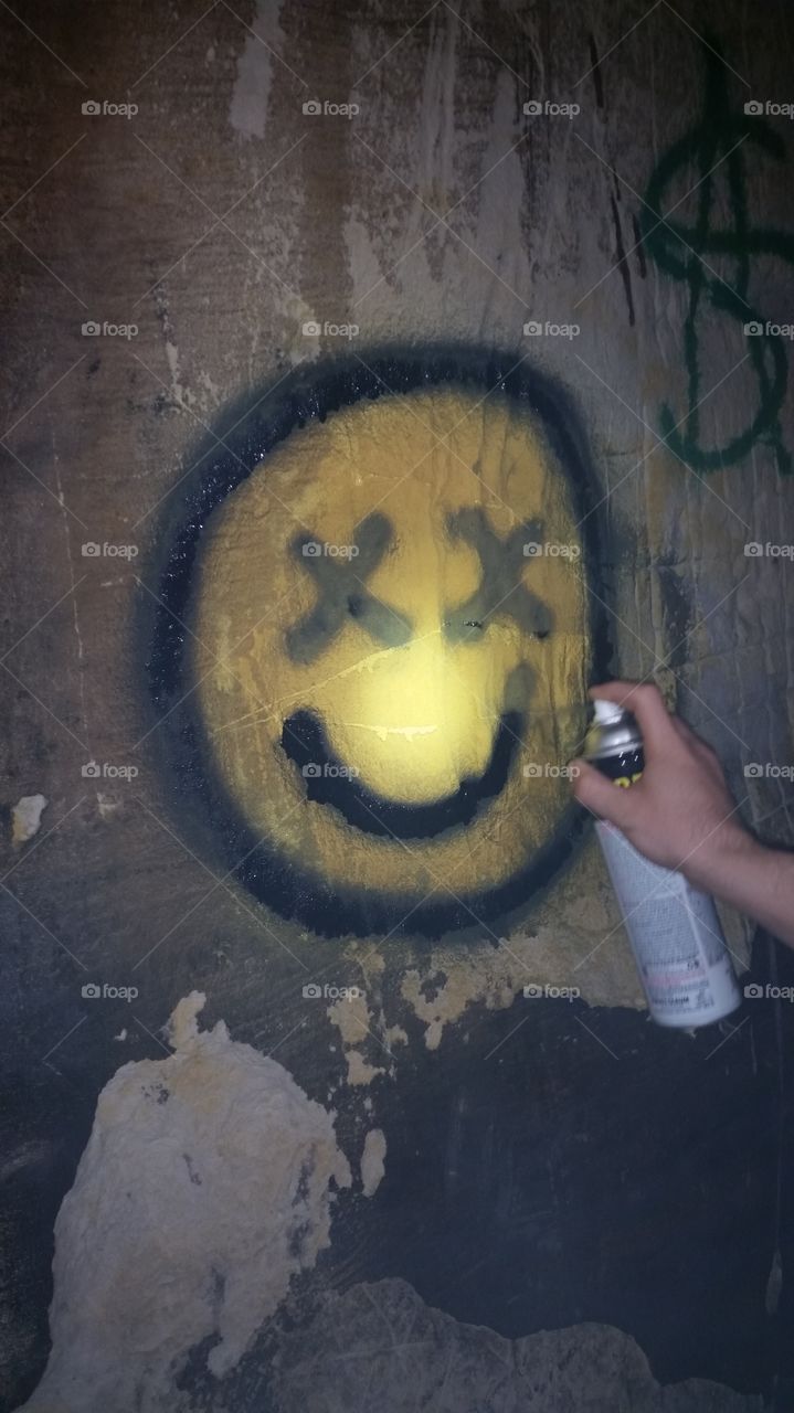 smiley face in cave