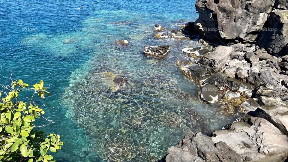Wild and rocky landscape of the Caribbean with turquoise sea