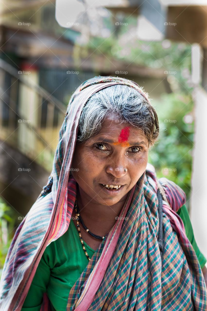 Recently I met a woman who leads her life by begging in the name of God. When I requested her for photo, she cried with happiness. Because she never had any photo sessions. Glad I was the first to take her photo.