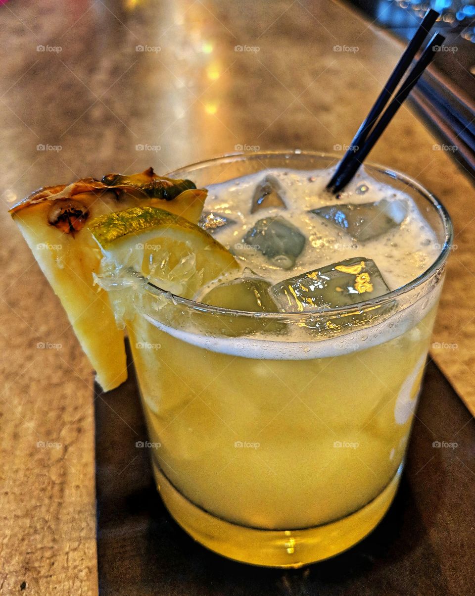 Refreshing fruity drink on ice