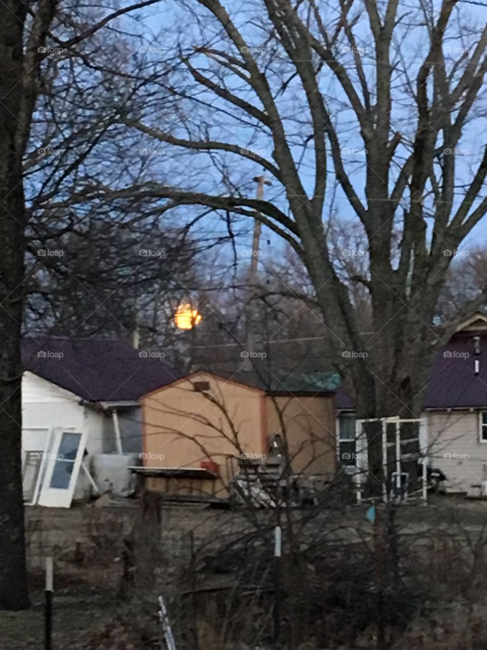 Looks like a full moon over our town tonight! Looks like its just hanging around.