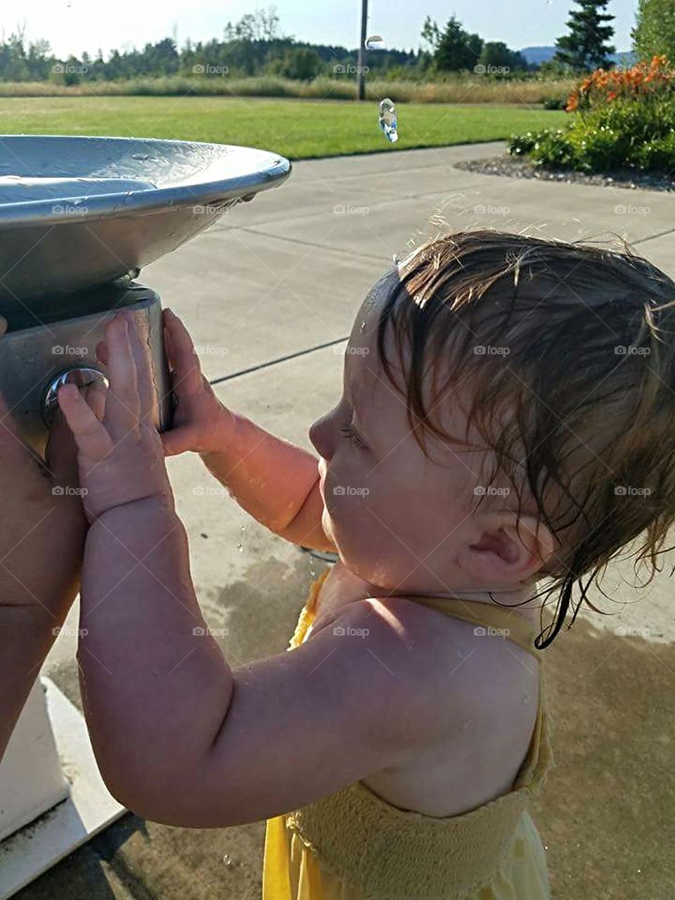 Playing in the drinking fountain