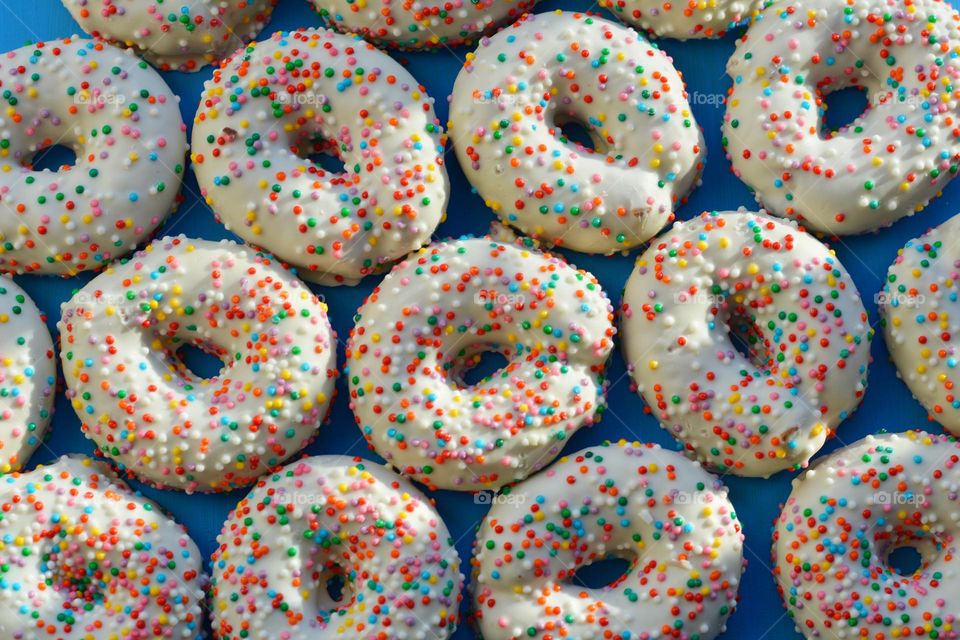 colour buns donuts round beautiful texture top view background