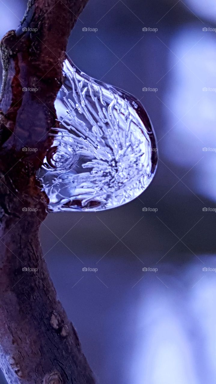 Frozen drop of water.