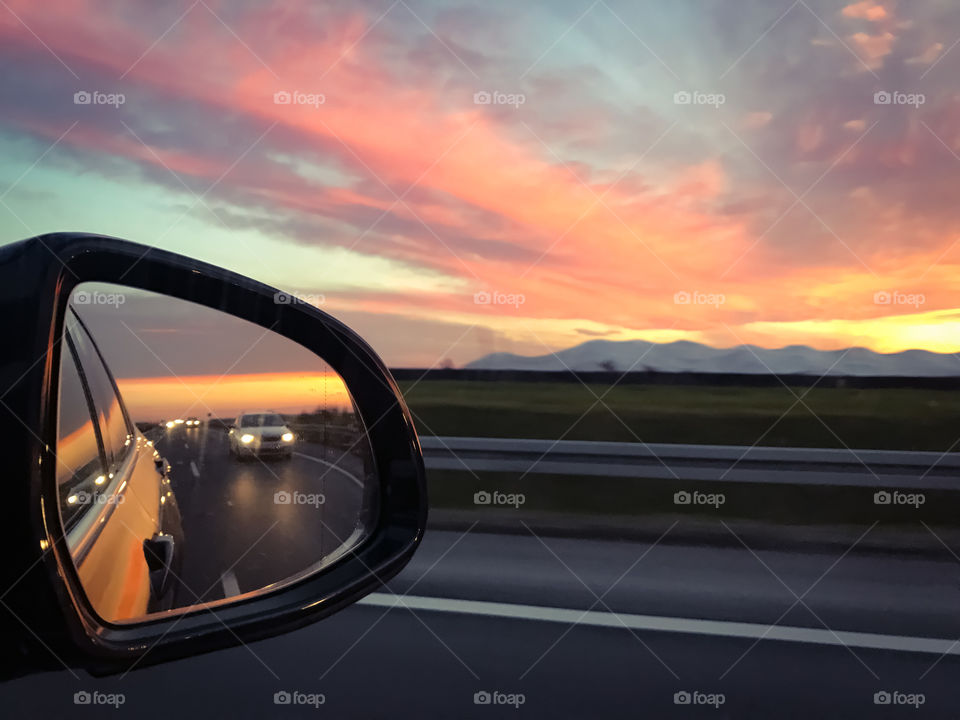 Sunset in a car mirror 