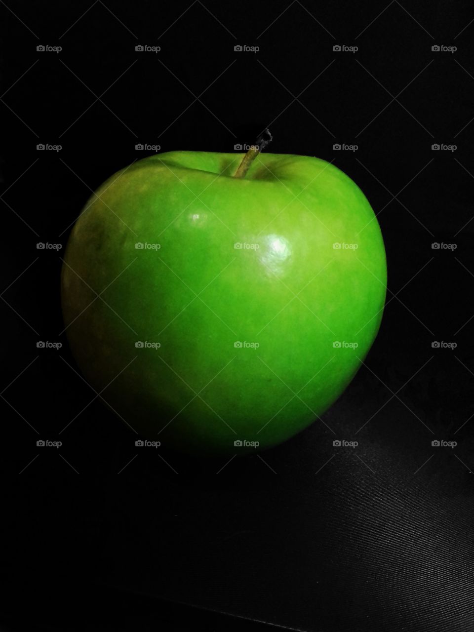 Studio shot of a green apple