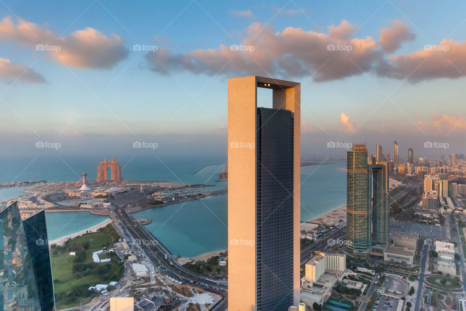 Aerial view of Abu Dhabi cityscape at golden hour