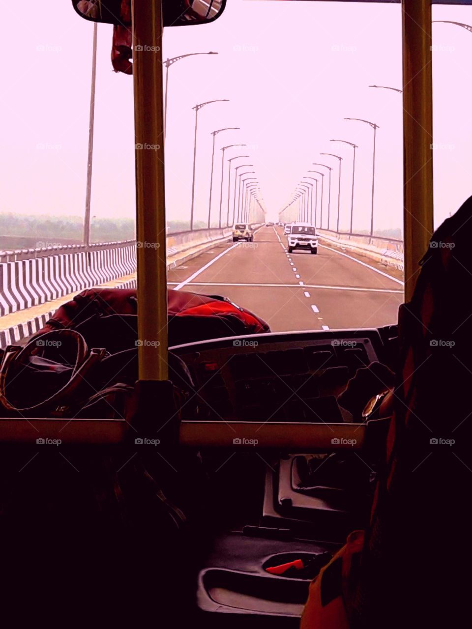 Assam ,Bogibil brige, on the brige runing car.Shoted pic from under the bus in traveling time.