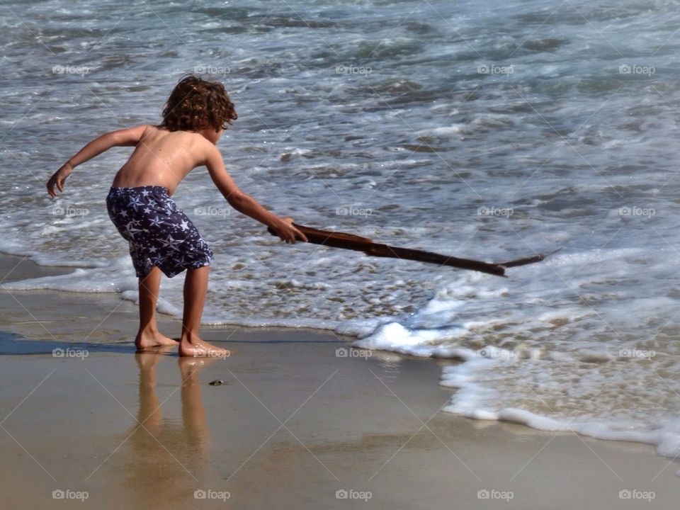 Boy enjoying the beach