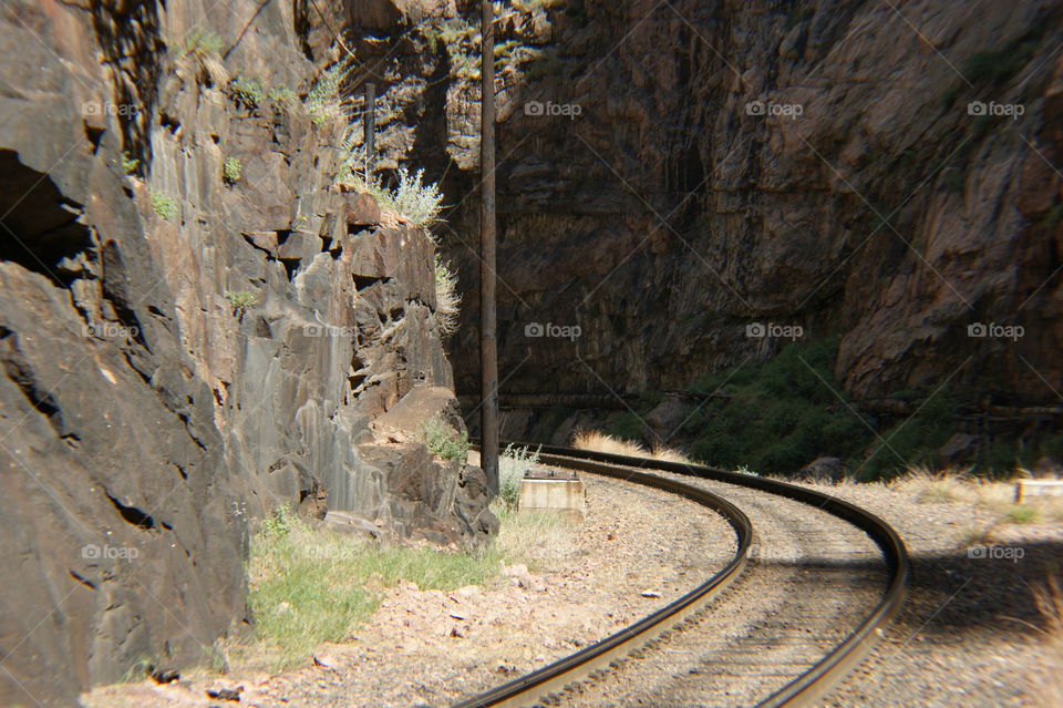 Train tracks at the bottom of The Royal Gorge in Colorado.