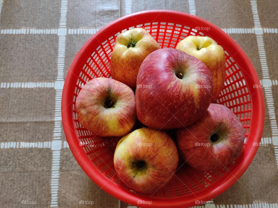 Red Apple's on the red basket