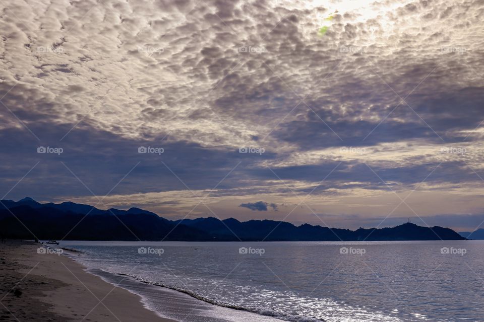 A beautiful formations of Low Clouds overviewing the beach and Pacific coast..