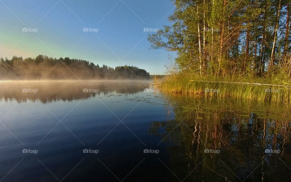 Sunrise over lake.