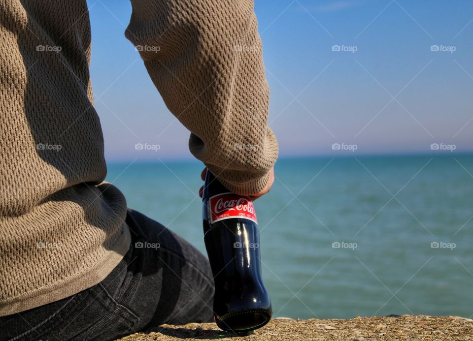 relaxing by the lake Michigan with Coca Cola