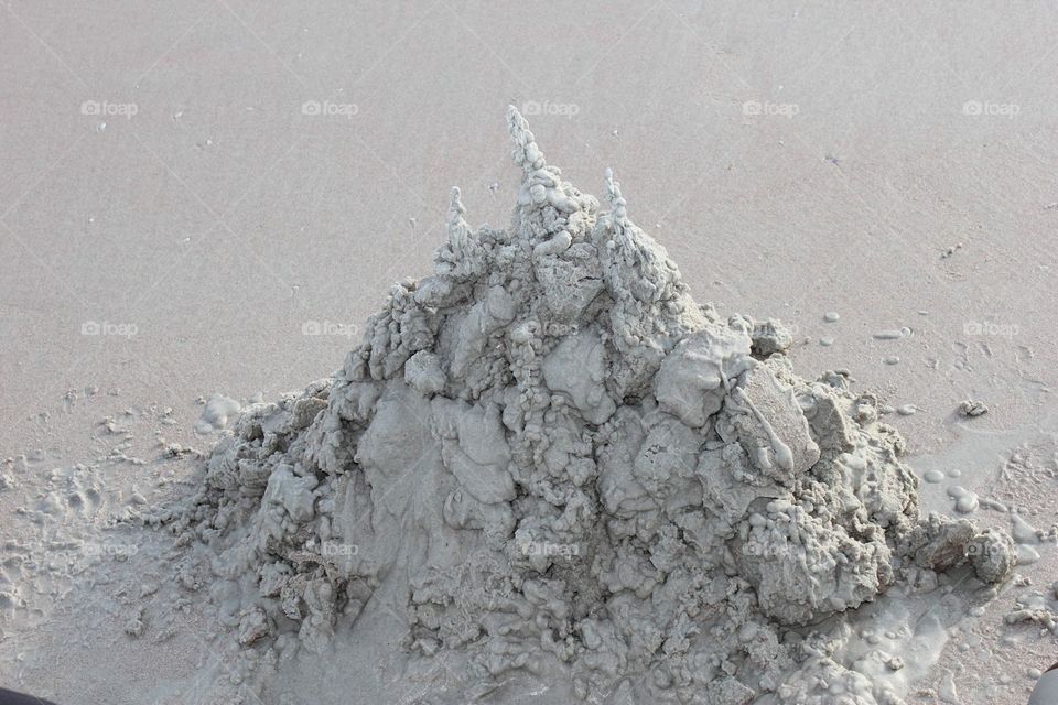 Child’s freehand sandcastle 