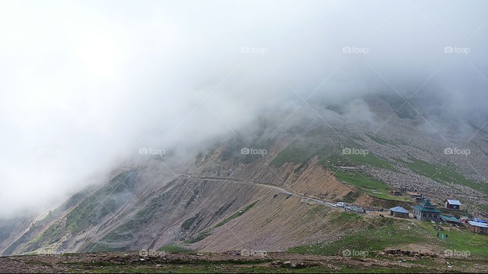 A beautiful picture of Mughal road near Historic Peer ki Galli Mosque at start of Zigs   -on Shopian Side  in mid Summer  ;having Clouds very close as usual.....