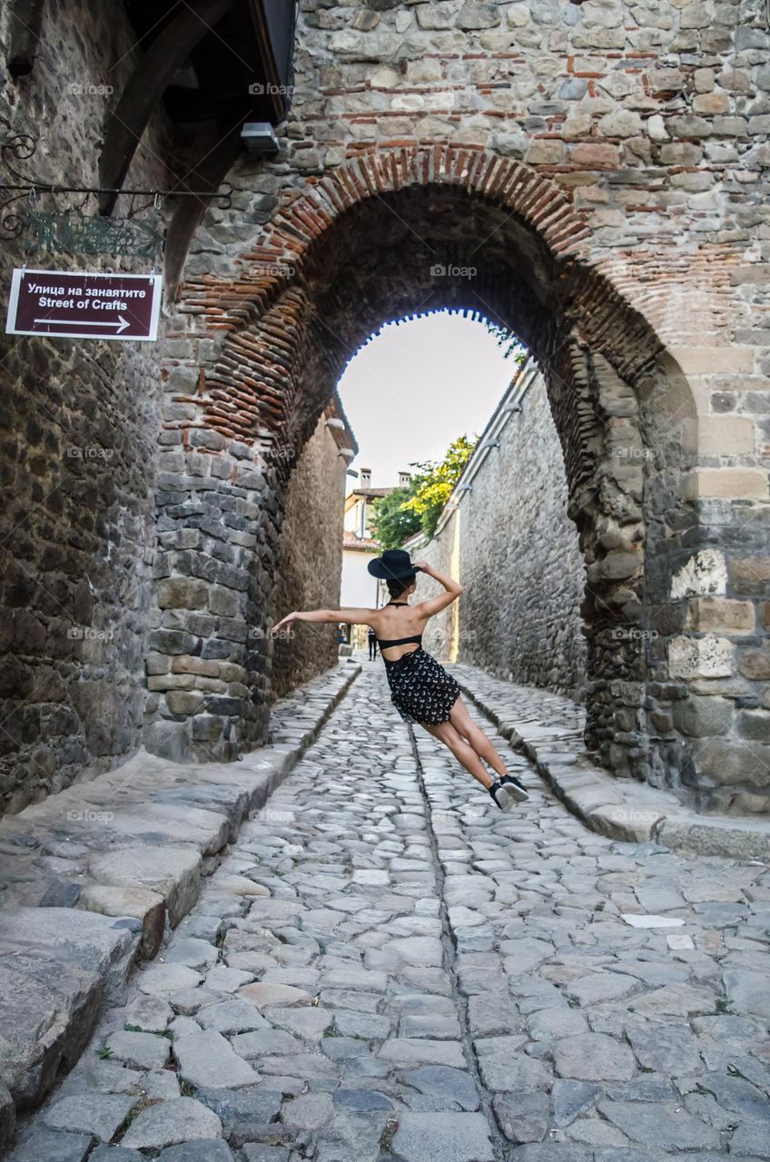 Young Female Ballerina Dancing Outside