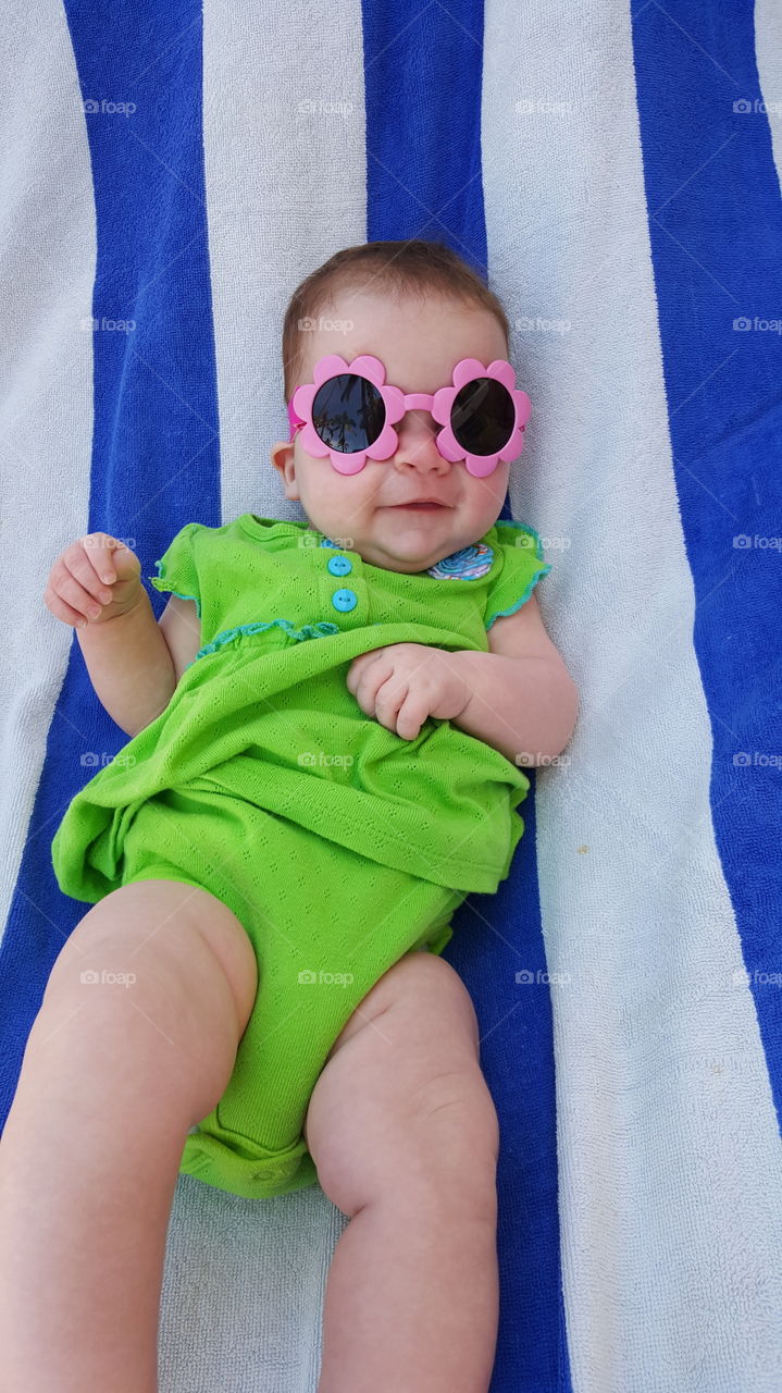 just chillin in her baby shades and looking adorable